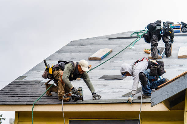 Professional Roofing technician working in Highland, NY